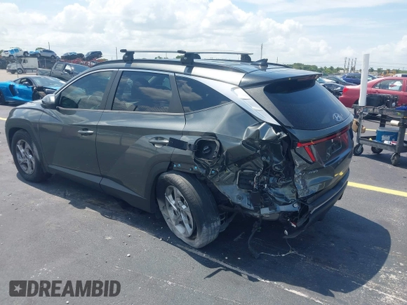 2022 Hyundai Tucson SEL with VIN 5NMJB3AE3NH069301, listed as a IAAI auction lot 42366081 with 26,971 mi miles and . Bid and sale history available at DreamBid. Image 3.