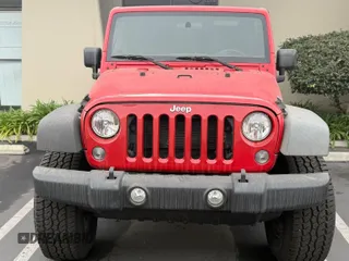 2015 Jeep Wrangler Sport with VIN 1C4AJWAG0FL750098, listed as a IAAI auction lot 41266454 with 77,115 mi miles. Bid and sale history available at carsss.com. Image 6.