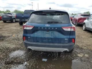 2020 Ford Escape SE with VIN 1FMCU9G64LUA83537, listed as a Copart auction lot 58823825 with 28,609 mi miles and Salvage title. Bid and sale history available at DreamBid. Image 6.
