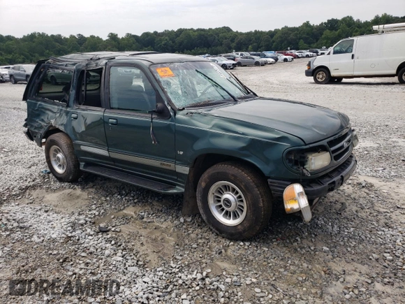 1998 Ford Explorer XLT with VIN 1FMZU32P8WZA91509, listed as a Copart auction lot 65531174 with 127,182 mi miles and Salvage title. Bid and sale history available at DreamBid. Image 4.
