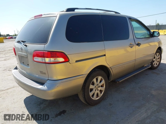 2002 Toyota Sienna LE with VIN 4T3ZF13C72U473555, listed as a IAAI auction lot 42426344 with 330,911 mi miles and . Bid and sale history available at DreamBid. Image 4.