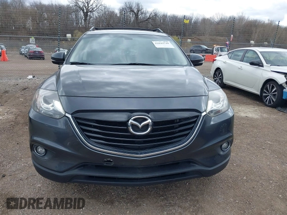 2015 Mazda CX-9 Grand Touring with VIN JM3TB3DV1F0465966, listed as a IAAI auction lot 42049749 with 74,470 mi miles and . Bid and sale history available at DreamBid. Image 12.