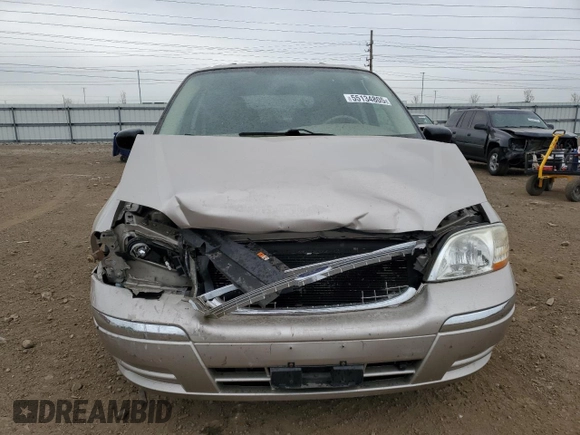 2003 Ford Windstar SE with VIN 2FMDA52413BB59104, listed as a Copart auction lot 55134805 with 132,918 mi miles and Salvage title. Bid and sale history available at DreamBid. Image 5.