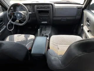 2000 Jeep Cherokee SE with VIN 1J4FF28S9YL133208, listed as a Copart auction lot 63827924 with 0 mi miles and Salvage Title. Bid and sale history available at carsss.com. Image 8.