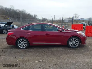 2016 Hyundai Azera Limited with VIN KMHFH4JG9GA555812, listed as a IAAI auction lot 41772140 with 103,027 mi miles. Bid and sale history available at carsss.com. Image 13.