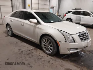 2013 Cadillac XTS Premium with VIN 2G61S5S38D9184976, listed as a IAAI auction lot 41263225 with 110,052 mi miles. Bid and sale history available at carsss.com. Image 1.