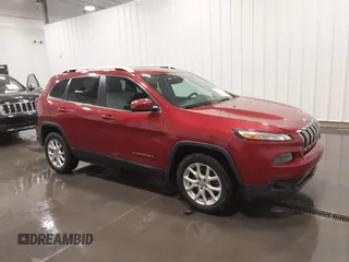 2015 Jeep Cherokee Latitude with VIN 1C4PJLCB6FW616477, listed as a IAAI auction lot 41812431 with 131,234 mi miles. Bid and sale history available at carsss.com. Image 1.