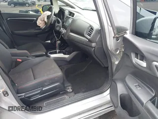 2018 Honda Fit Sport with VIN 3HGGK5H62JM702562, listed as a IAAI auction lot 41556944 with 137,416 mi miles. Bid and sale history available at carsss.com. Image 5.