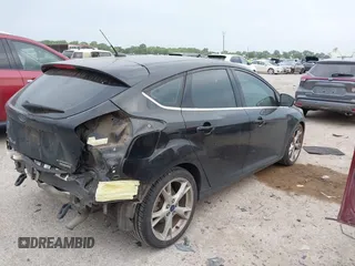 2015 Ford Focus Titanium с VIN 1FADP3N25FL374402, выставлен на аукционе IAAI как лот 42036678 с пробегом 85 785 миль миль и . История ставок и продаж доступна на DreamBid. Изображение 4.