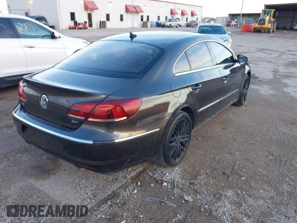 2015 Volkswagen CC Lux with VIN WVWRP7AN9FE819154, listed as a IAAI auction lot 41669832 with 151,142 mi miles. Bid and sale history available at carsss.com. Image 4.