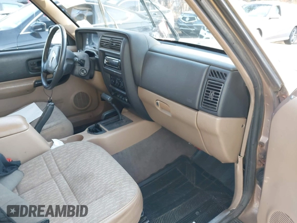 1999 Jeep Cherokee Sport with VIN 1J4FF68S2XL554452, listed as a IAAI auction lot 41930116 with 194,230 mi miles and . Bid and sale history available at DreamBid. Image 5.