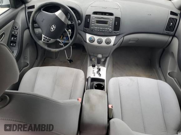 2007 Hyundai Elantra GLS z VIN KMHDU46D77U229572, wystawiony jako Copart lot #56008515 z przebiegiem 75 374 mil mil oraz Szkoda całkowita • Salvage title. Historia ofert i sprzedaży dostępna na DreamBid. Obrazek 8.