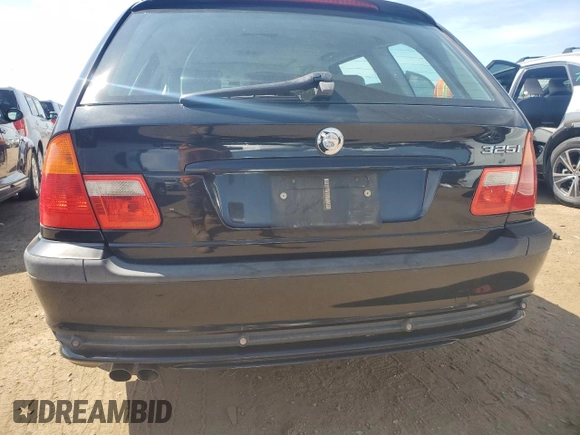 2003 BMW 3 Series 325i with VIN WBAEN33483PC12700, listed as a Copart auction lot 67770984 with 171,840 mi miles and Salvage Title. Bid and sale history available at carsss.com. Image 6.