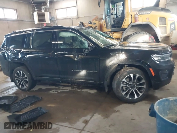 2021 Jeep Grand Cherokee Overland with VIN 1C4RJKDG8M8164904, listed as a IAAI auction lot 41352092 with 57,707 mi miles and . Bid and sale history available at DreamBid. Image 13.