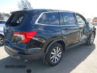 2020 Honda Pilot EX-L with VIN 5FNYF5H54LB009448, listed as a IAAI auction lot 41697106 with 63,310 mi miles. Bid and sale history available at carsss.com. Image 4.