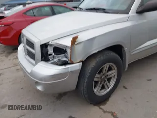 2007 Dodge Dakota SLT z VIN 1D7HW48K77S129162, wystawiony jako IAAI lot #41842077 z przebiegiem 186 172 mil mil oraz . Historia ofert i sprzedaży dostępna na DreamBid. Obrazek 6.