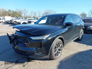 2022 Acura MDX w/A-Spec Package with VIN 5J8YE1H02NL002158, listed as a IAAI auction lot 41633998 with 105,000 mi miles. Bid and sale history available at carsss.com. Image 2.