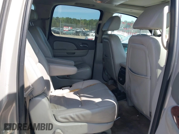 2007 Chevrolet Suburban LS with VIN 1GNFC16087J239886, listed as a IAAI auction lot 41874548 with 303,014 mi miles and . Bid and sale history available at DreamBid. Image 8.