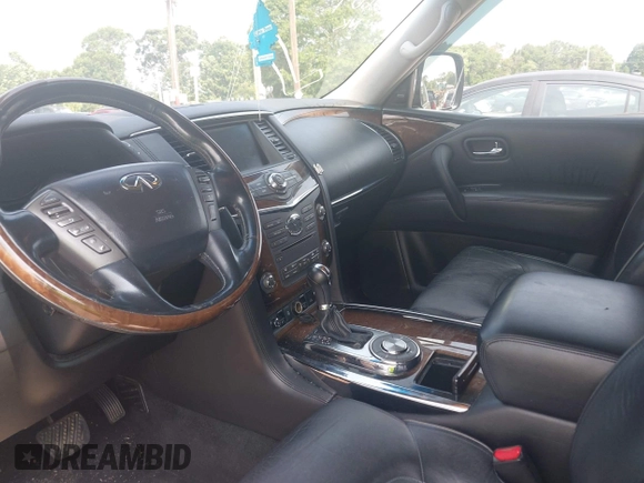 2013 Infiniti QX56 with VIN JN8AZ2NF7D9530166, listed as a IAAI auction lot 42360609 with 214,484 mi miles and . Bid and sale history available at DreamBid. Image 5.