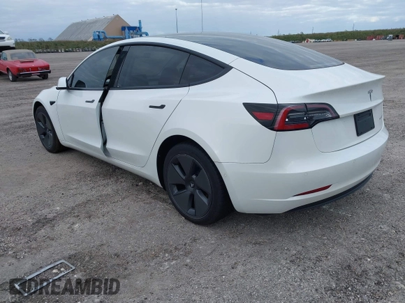 2021 Tesla Model 3 Long Range z VIN 5YJ3E1EB7MF979988, wystawiony jako IAAI lot #40893463 z przebiegiem 38 230 mil mil oraz . Historia ofert i sprzedaży dostępna na DreamBid. Obrazek 3.