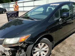 2012 Honda Civic LX z VIN 19XFB2F50CE051626, wystawiony jako Copart lot #59477235 z przebiegiem 126 225 mil mil oraz Szkoda całkowita • Salvage title. Historia ofert i sprzedaży dostępna na DreamBid. Obrazek 13.