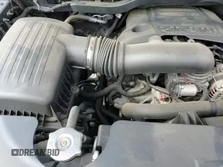 2021 Ram 1500 Big Horn z VIN 1C6SRFBT8MN781374, wystawiony jako Copart lot #65876845 z przebiegiem 62 822 mil mil oraz Szkoda całkowita • Salvage title. Historia ofert i sprzedaży dostępna na DreamBid. Obrazek 16.