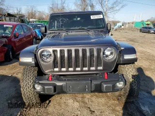 2021 Jeep Wrangler Unlimited Rubicon with VIN 1C4JJXFG8MW869995, listed as a Copart auction lot 83472254 with 48,302 mi miles and Salvage Title. Bid and sale history available at carsss.com. Image 5.