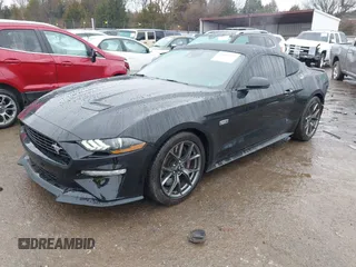 2022 Ford Mustang EcoBoost with VIN 1FA6P8TD1N5111126, listed as a IAAI auction lot 41449765 with 42,852 mi miles. Bid and sale history available at carsss.com. Image 2.