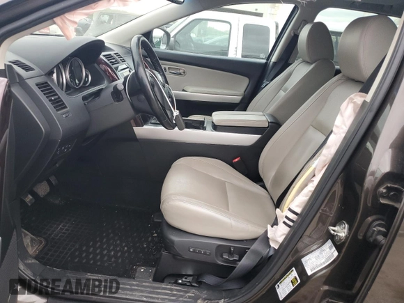 2015 Mazda CX-9 Grand Touring z VIN JM3TB2DA0F0468350, wystawiony jako Copart lot #61545095 z przebiegiem 154 050 mil mil oraz Szkoda całkowita • Salvage title. Historia ofert i sprzedaży dostępna na DreamBid. Obrazek 7.
