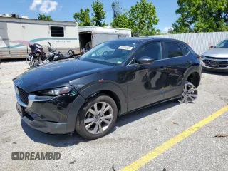 2021 Mazda CX-30 Select with VIN 3MVDMABL2MM249548, listed as a Copart auction lot 57339905 with 114,710 mi miles and Salvage title. Bid and sale history available at DreamBid. Image 1.