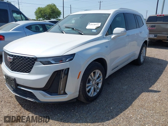 2023 Cadillac XT6 FWD Luxury z VIN 1GYKPAR4XPZ182533, wystawiony jako IAAI lot #42078937 z przebiegiem 31 248 mil mil oraz . Historia ofert i sprzedaży dostępna na DreamBid. Obrazek 2.