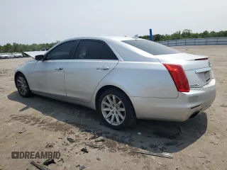 2014 Cadillac CTS Luxury AWD with VIN 1G6AX5SX5E0129143, listed as a Copart auction lot 58914015 with 131,465 mi miles and Salvage title. Bid and sale history available at DreamBid. Image 2.
