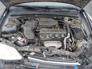 2001 Honda Civic DX with VIN 2HGES15221H525334, listed as a IAAI auction lot 41559664 with 309,641 mi miles. Bid and sale history available at carsss.com. Image 10.