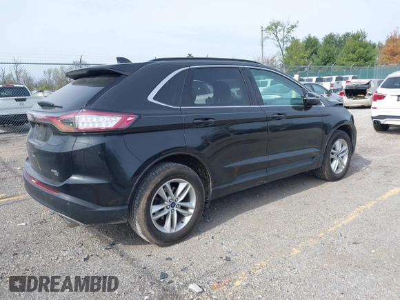 2015 Ford Edge SEL with VIN 2FMTK4J88FBB05259, listed as a IAAI auction lot 42043247 with 128,987 mi miles. Bid and sale history available at carsss.com. Image 4.