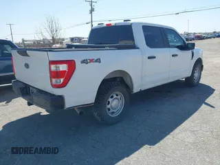 2022 Ford F-150 XL with VIN 1FTFW1E53NFA27670, listed as a IAAI auction lot 41976233 with 116,691 mi miles. Bid and sale history available at carsss.com. Image 4.