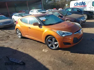 2013 Hyundai Veloster w/Gray Int with VIN KMHTC6AD3DU126193, listed as a IAAI auction lot 41251982 with 119,066 mi miles. Bid and sale history available at carsss.com. Image 1.