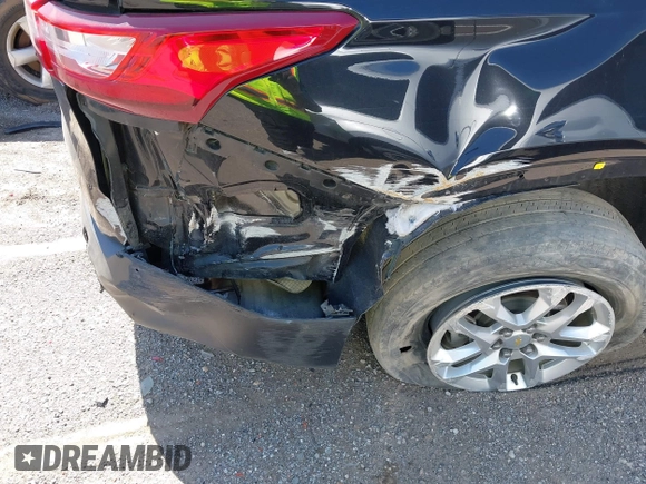2020 Chevrolet Traverse LS z VIN 1GNERFKW0LJ172972, wystawiony jako IAAI lot #42011302 z przebiegiem 90 799 mil mil oraz . Historia ofert i sprzedaży dostępna na DreamBid. Obrazek 21.