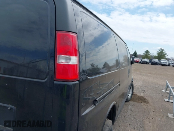 2016 Chevrolet Express Cargo Van with VIN 1GCWGAFGXG1260362, listed as a IAAI auction lot 41813990 with 141,741 mi miles. Bid and sale history available at carsss.com. Image 4.