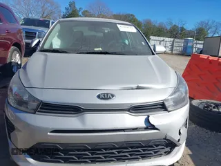 2021 Kia Rio S with VIN 3KPA24AD4ME363969, listed as a IAAI auction lot 41304242 with 119,194 mi miles and . Bid and sale history available at DreamBid. Image 12.