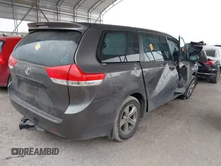 2014 Toyota Sienna L with VIN 5TDZK3DC5ES475204, listed as a IAAI auction lot 41277584 with 125,735 mi miles. Bid and sale history available at carsss.com. Image 4.