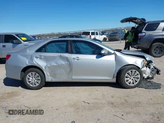 2014 Toyota Camry L with VIN 4T1BF1FK7EU856848, listed as a IAAI auction lot 41729604 with 100,148 mi miles. Bid and sale history available at carsss.com. Image 13.