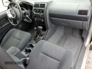 2004 Nissan Frontier XE Desert Runner with VIN 1N6ED26Y44C402138, listed as a Copart auction lot 58828425 with 125,143 mi miles and Salvage title. Bid and sale history available at DreamBid. Image 8.