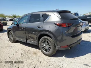 2017 Mazda CX-5 Touring with VIN JM3KFACL1H0100436, listed as a Copart auction lot 53058875 with 77,205 mi miles and Salvage Title. Bid and sale history available at DreamBid. Image 2.