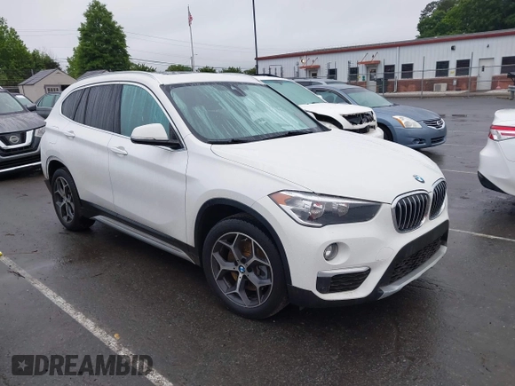 2019 BMW X1 xDrive28i with VIN WBXHT3C54K3H35641, listed as a IAAI auction lot 42241894 with 100,989 mi miles and . Bid and sale history available at DreamBid. Image 1.