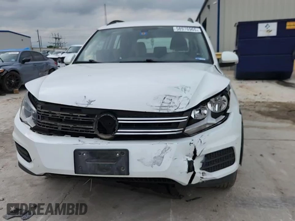 2017 Volkswagen Tiguan S с VIN WVGAV7AX6HK034093, выставлен на аукционе Copart как лот 58976965 с пробегом 103 474 миль миль и Списание • Salvage title. История ставок и продаж доступна на DreamBid. Изображение 14.