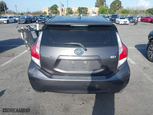 2015 Toyota Prius c One with VIN JTDKDTB33F1585004, listed as a IAAI auction lot 41950129 with 209,233 mi miles. Bid and sale history available at carsss.com. Image 16.
