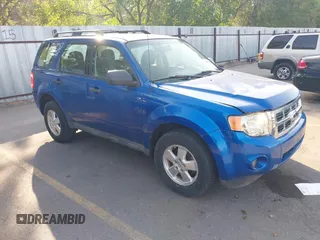2011 Ford Escape XLS with VIN 1FMCU0C78BKC16059, listed as a IAAI auction lot 42577234 with 210,890 mi miles and . Bid and sale history available at DreamBid. Image 1.