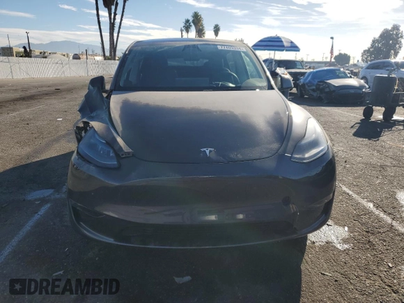 2024 Tesla Model Y Long Range с VIN 7SAYGDEE3RA236473, выставлен на аукционе Copart как лот 77409334 с пробегом 5 822 миль миль и Списание • Salvage title. История ставок и продаж доступна на DreamBid. Изображение 5.