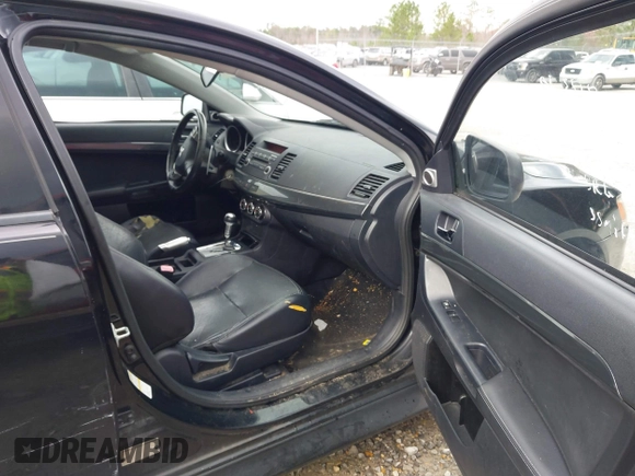 2011 Mitsubishi Lancer GTS with VIN JA32U8FW0BU005510, listed as a IAAI auction lot 41678936 with 204,511 mi miles. Bid and sale history available at carsss.com. Image 5.