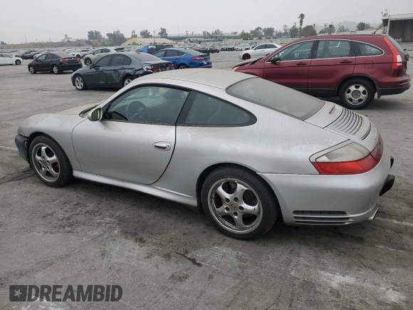 2004 Porsche 911 Carrera z VIN WP0AA29904S623031, wystawiony jako Copart lot #76551074 z przebiegiem 145 478 mil mil oraz Szkoda całkowita • Salvage title. Historia ofert i sprzedaży dostępna na DreamBid. Obrazek 2.